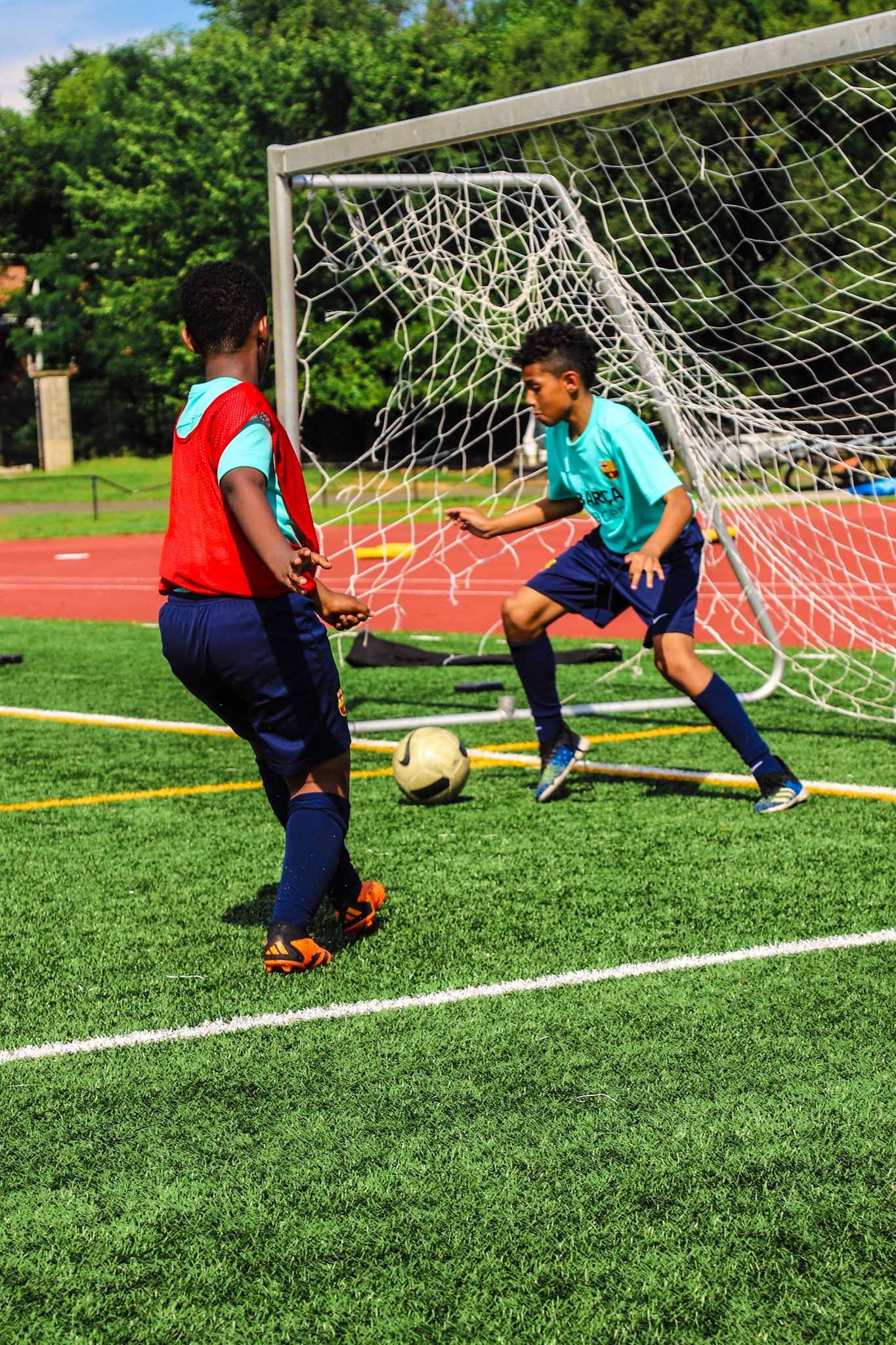 boy practicing footwork drills for goalkeepers
