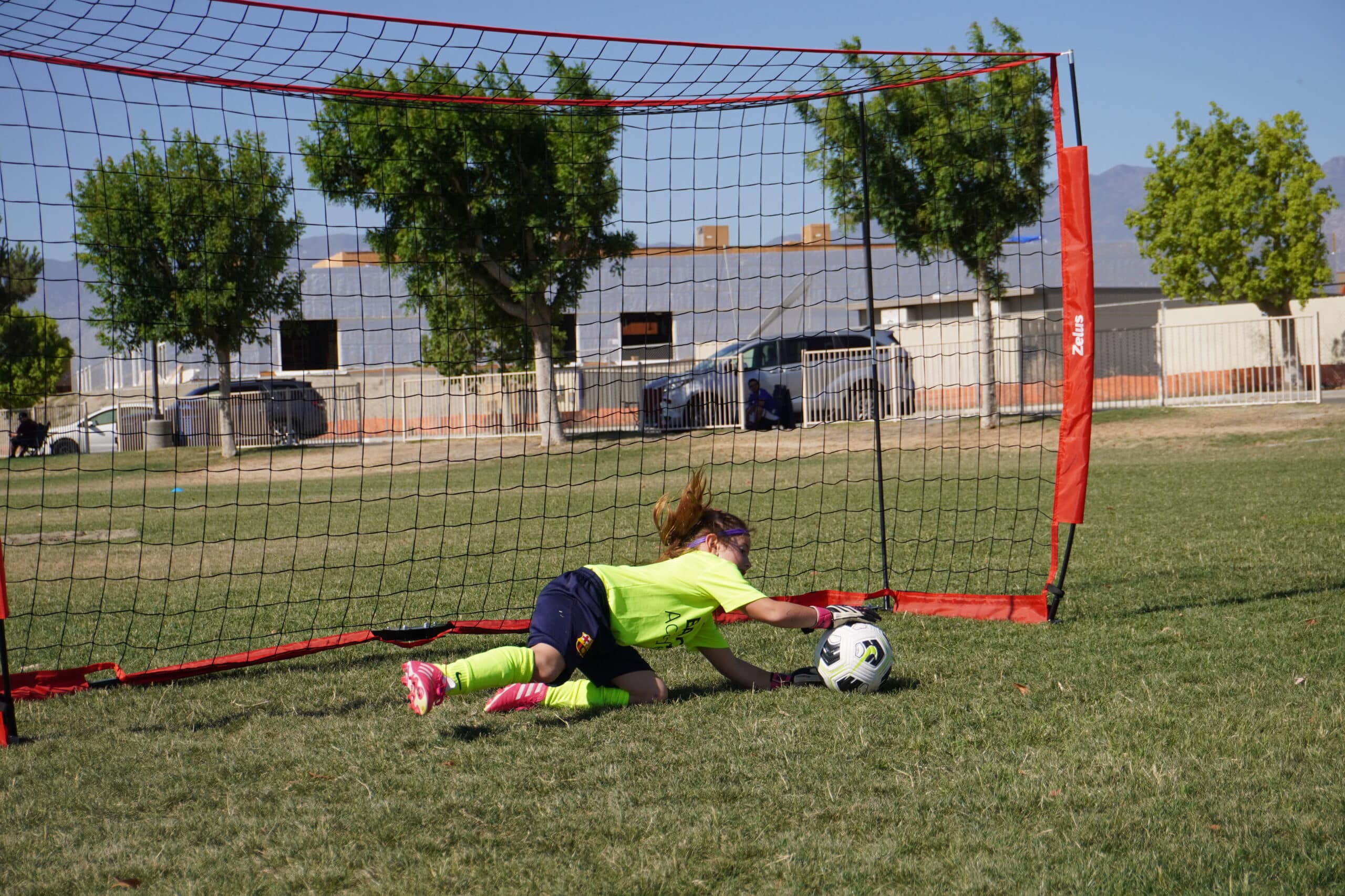 girl practicing footwork drills for goalkeepers