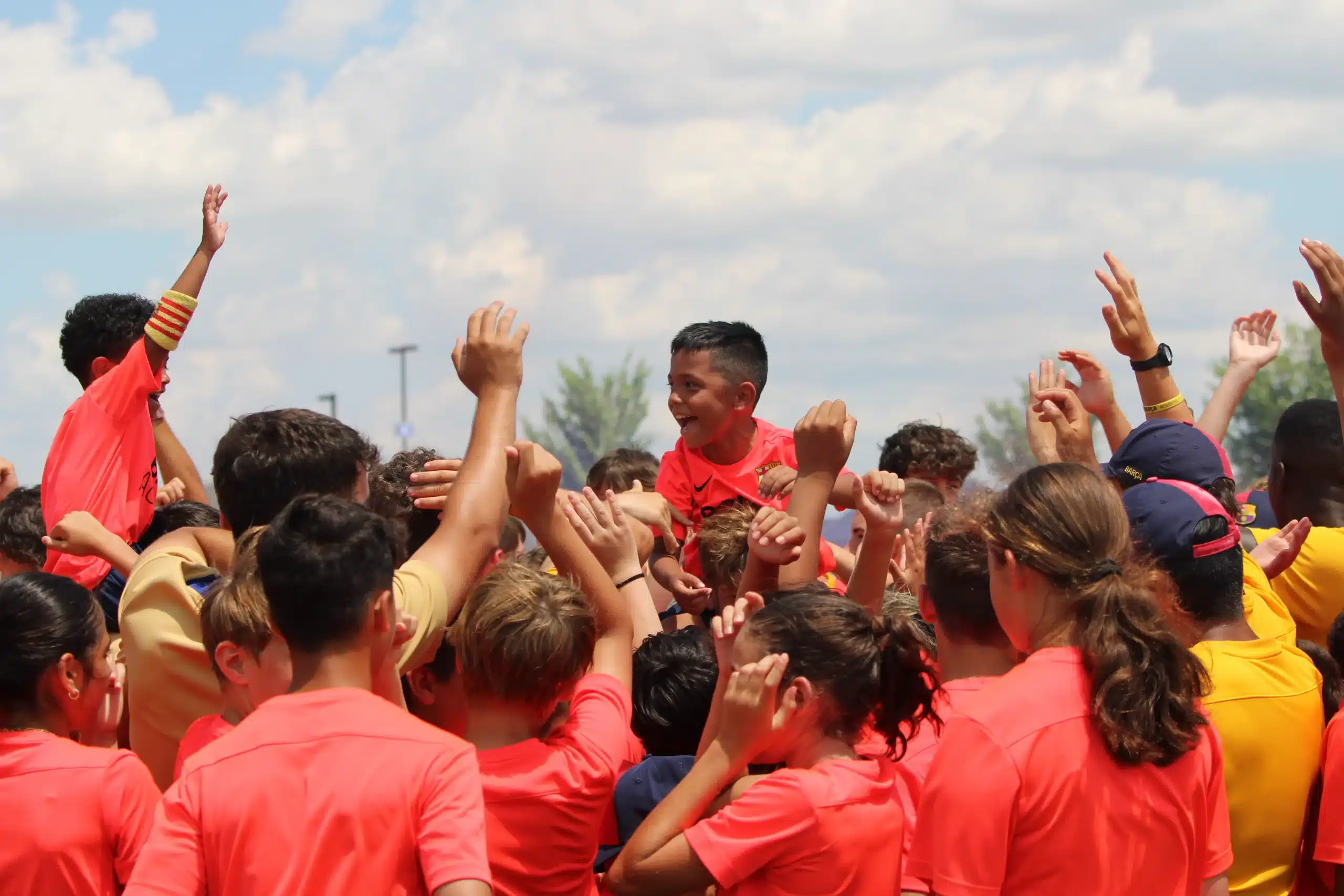 Kids celebrating in one of the best soccer camps in Los Angeles.